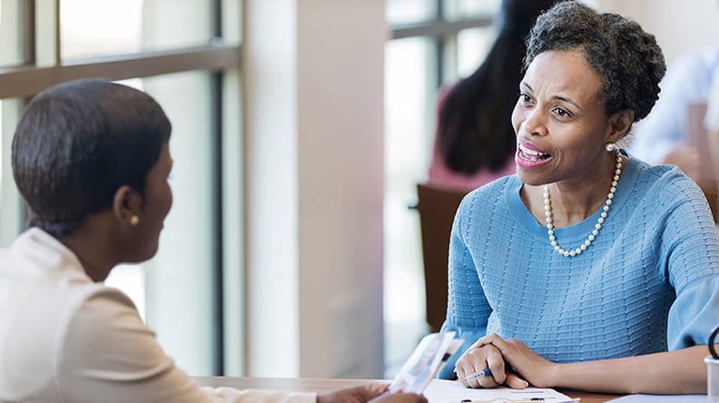 banker advising woman