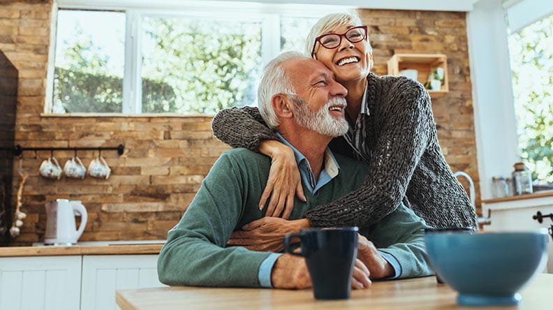 older couple hugging