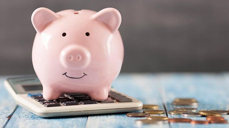 piggy bank on a calculator
