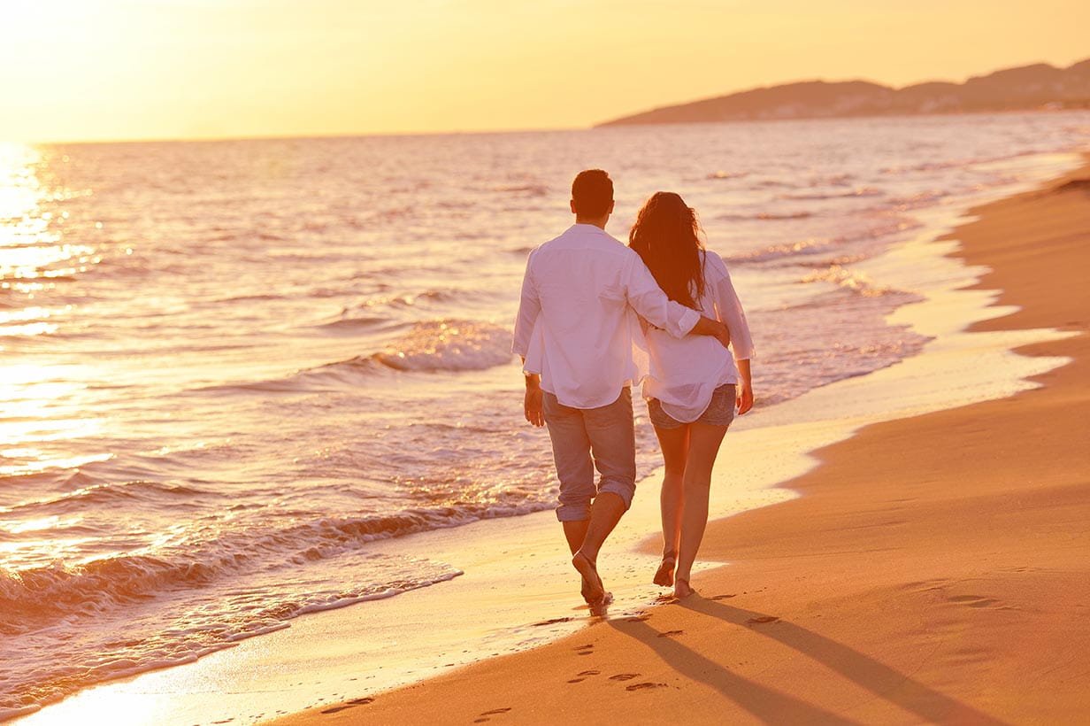 couple walking on the beach